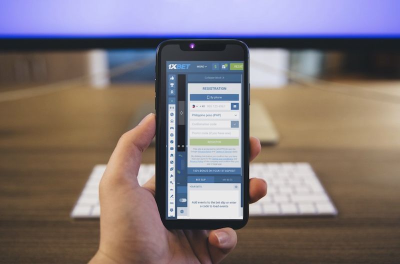 1xBet Casino on a phone screen